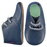 Mighty Shoes Navy Desert Boot. Children's ankle boot in navy blue leather. Poco Nido baby, toddler and childrens shoes make unique gifts - as christmas gifts, stocking fillers, baby shower gifts, new parent gifts, to celebrate new walking skills and many other occasions. They are great toddler shoes too and are perfect for daycare settings.