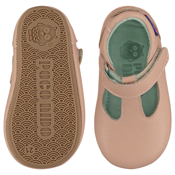 Mighty Shoes. Blush pink leather T bar shoes, leather lined. Poco Nido baby, toddler and childrens shoes make unique gifts - as christmas gifts, stocking fillers, baby shower gifts, new parent gifts, to celebrate new walking skills and many other occasions. They are great toddler shoes too and are perfect for daycare settings.
