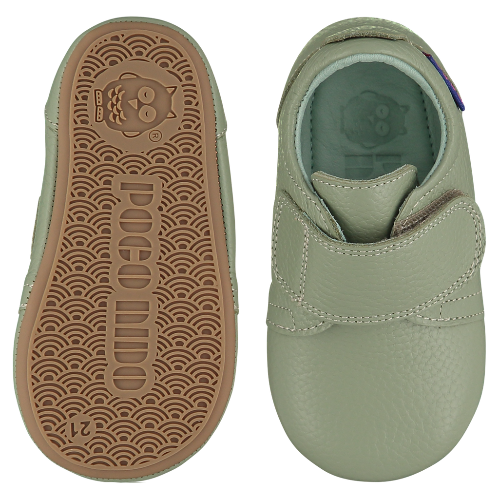 Mighty Shoes. Sage green strap shoes. Pale sage green leather strap shoes, leather lined. Poco Nido baby, toddler and childrens shoes make unique gifts - as christmas gifts, stocking fillers, baby shower gifts, new parent gifts, to celebrate new walking skills and many other occasions. They are great toddler shoes too and are perfect for daycare settings.