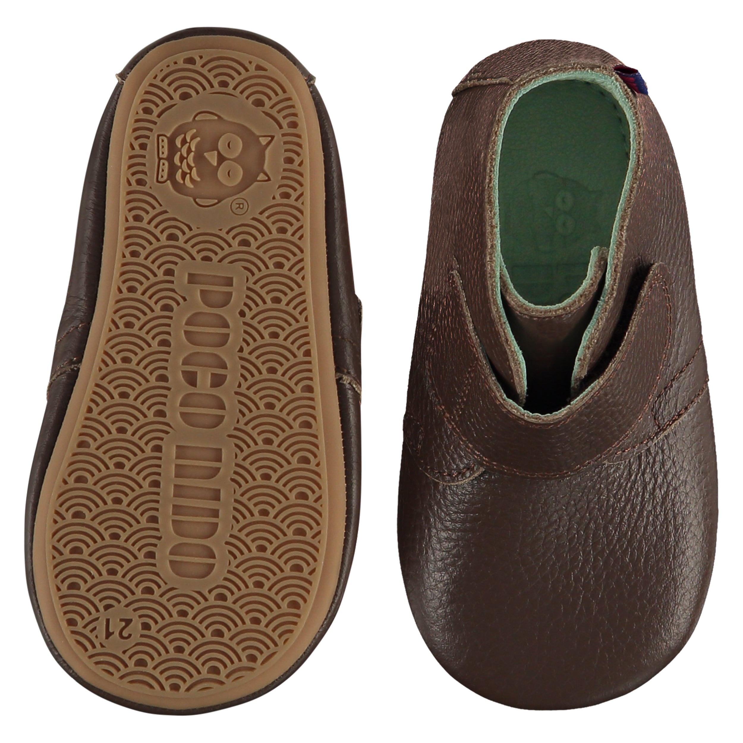 A pair of childrens adjustable strap ankle boots, one viewed from the top, one is a view of the sole. They are in dark brown colour leather with a large adjustable strap over the foot. They have a  pale blue leather lining and insole. The sole is a natural gum colour.