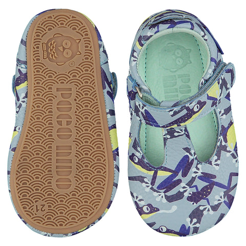 Mighty Shoes Blue Tree Frog T Bar. Children's shoe in sky blue colour leather with a tree frog all over print. Barefoot shoe with self fastening strap and a flat, super flexible TPU rubber sole. The sole has the Poco Nido logo on it. View of top and sole. Black friday sale